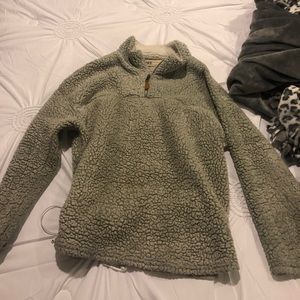 buckle fuzzy pullover